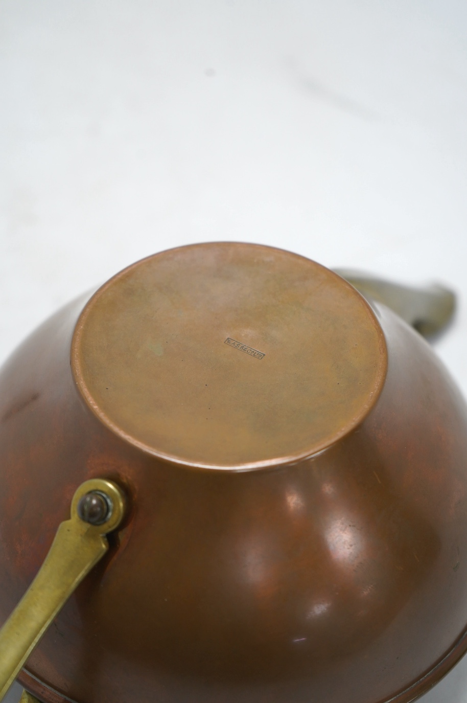 An Arts & Crafts W A S Benson teapot, 11cm high. Condition - fair